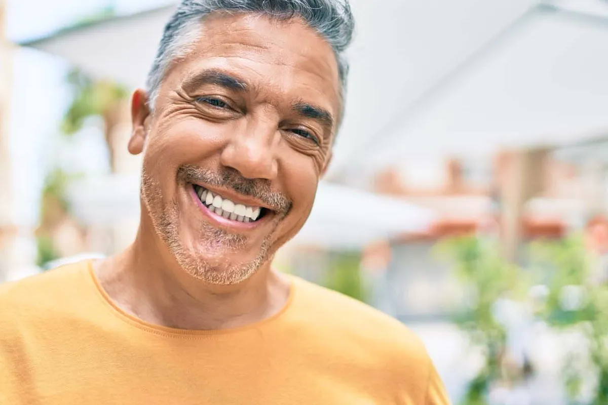 A man smiling for a photo